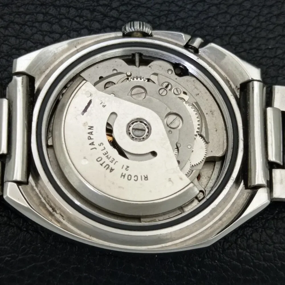 Vintage 1975 Ricoh Automatic Mens Silver Watch W/daydate & Blue accents